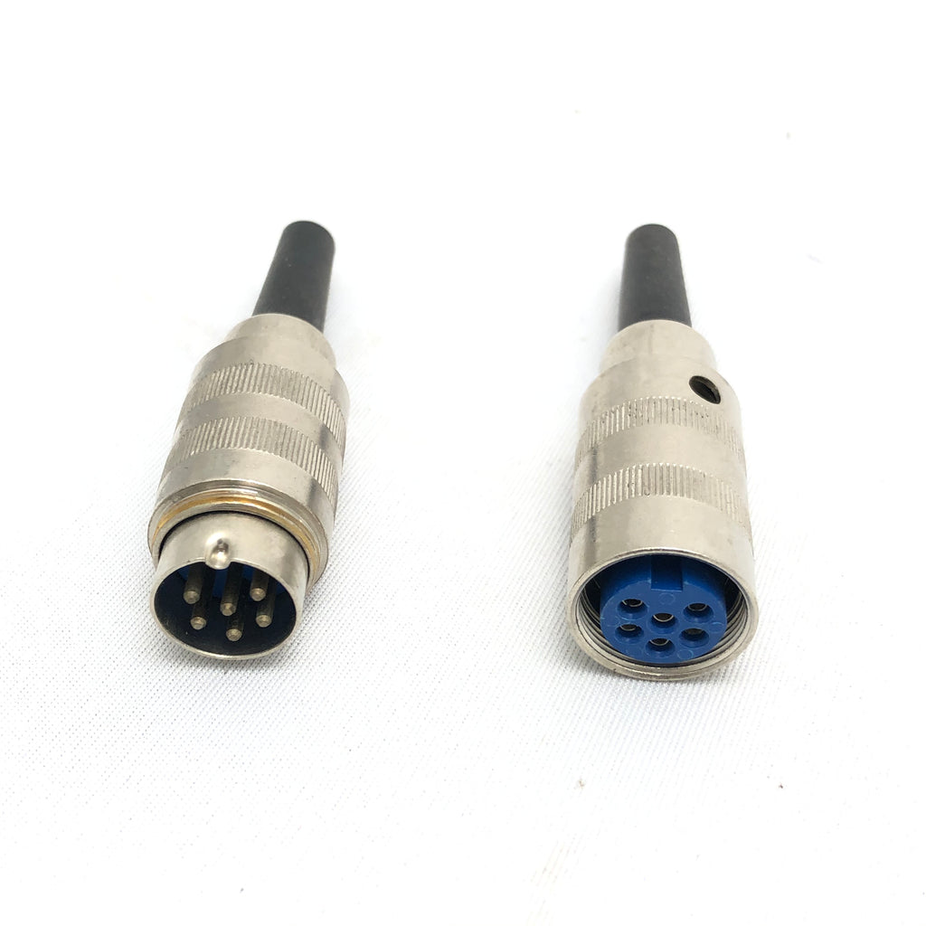 Tuchel 6 Pin din connector on a white background